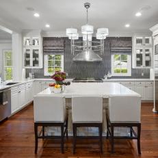 Gray and White Open Plan Kitchen With Island
