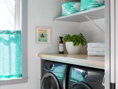 Laundry Room With Contemporary Light And Patterned Floor Tiles