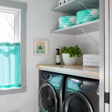Colorful Laundry Room With Patterned Floor Tiles