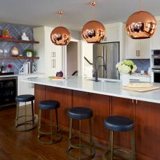 Contemporary Kitchen With Copper Pendants