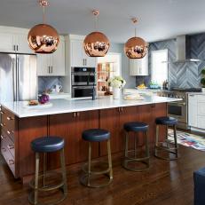 Contemporary Open Plan Kitchen With Copper Pendants