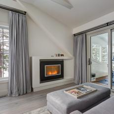 Fireplace and Gray Curtains