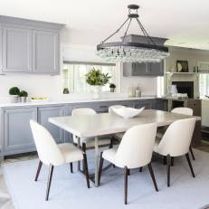 Gray Dining Area With White Chairs