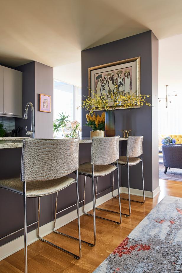 Bold Kitchen Island With Animal Print Chairs | HGTV