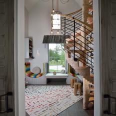 Industrial Playroom With Spiral Stairs