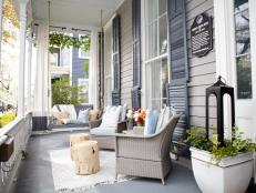 Welcoming Front Porch With Charming Porch Swing