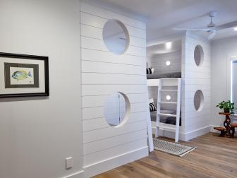 Black-And-White Bunk Beds With Nautical Portholes