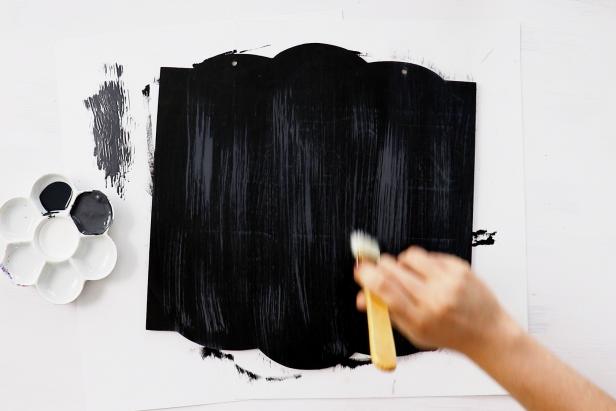 Mix white and black paint to create a light gray color, then use a dry brush to subtly add a wood grain texture.
