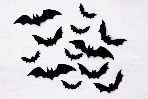 Print out bat silhouettes, cut them out and then trace them onto black cardstock. You can make as many as you need for Halloween crafting and decorating.