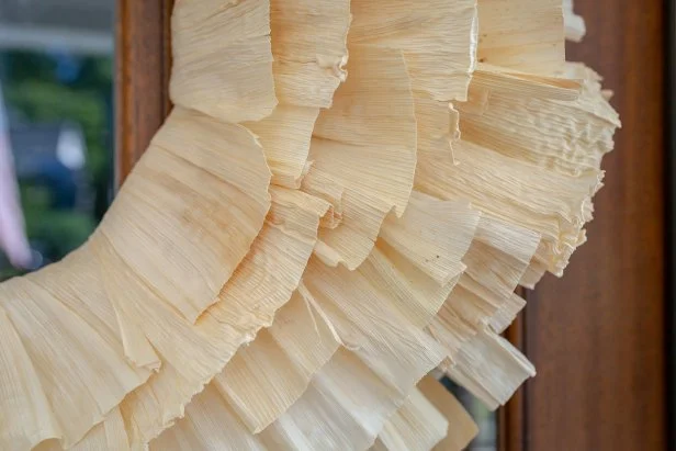 Not just for tamales anymore, a corn husk wreath is the perfect way to bring the feel of autumn to your front door.