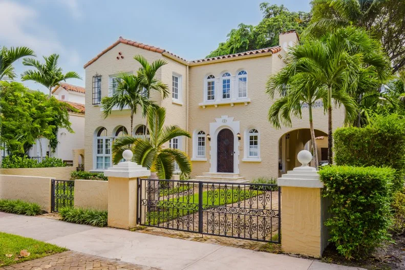 Yellow Home Exterior and Gate