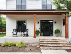 Mixed Metal And Warm Wood Front Porch On Modern Farmhouse