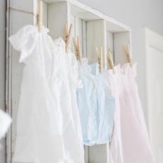 Nursery Details With Baby Clothes