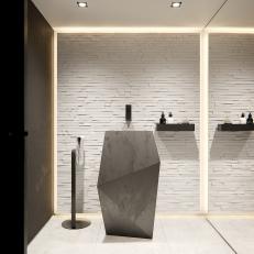 Black and White Modern Powder Room With Stone Wall