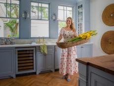 Designer Grace Mitchell, of HGTV's One of a Kind, in the kitchen that she designed for the McGuire family.