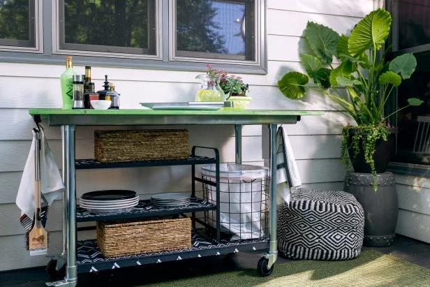 Need more storage and prep space in your outdoor kitchen? See how we transformed an old kitchen cart into a multi-functional, weather-resistant kitchen island on wheels.