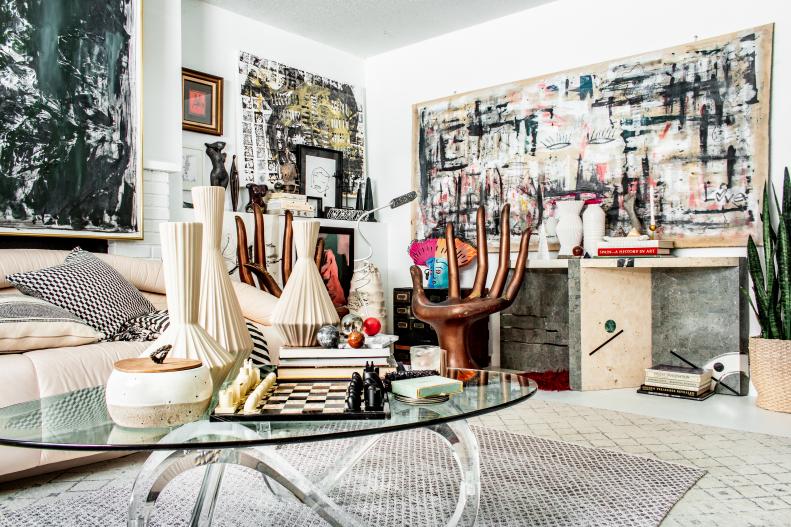A self-described “eclectic maximalist,” Gladys puts her design abilities on full display in her living room. The combination of modern furnishings, vintage accessories and quirky objects draw the eye in a dozen directions at once, promising new delights at every glance. Gladys is quick to name the space as one of her favorites in the home, largely because it houses some of her most treasured pieces. “It’s a collection of special objects and happy memories,” she says.