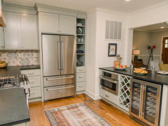 As seen on Home Town, the Mauldin residence has been fully renovated by Ben and Erin Napier.  The new kitchen now boasts plenty of space with a kitchen island, and is updated with all new appliances. (After 4)