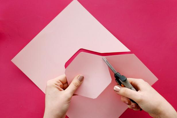 Cut the shape out along the solid lines. Cut from the other side of each short line to the dot to create tabs between each section. Glue the tabs in place to form a paper saucer.