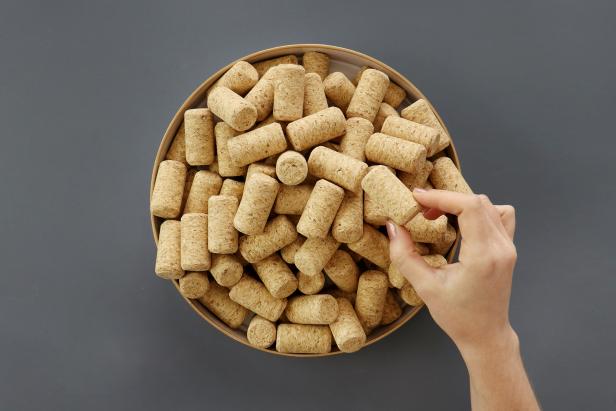 Figure out how many wine corks will fit in your tray. Our 10¼” round tray fit 91 corks.
