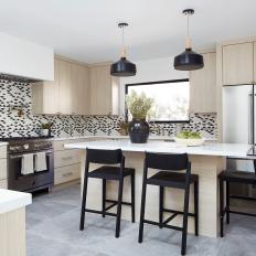 Contemporary Kitchen With Black Barstools