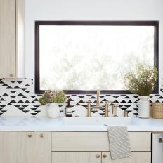 Kitchen with Black and White Tile Backsplash