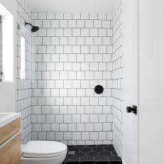 Black and White Modern Bathroom With Wood Vanity