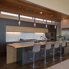 Brown Modern Open Plan Kitchen With Leather Barstools
