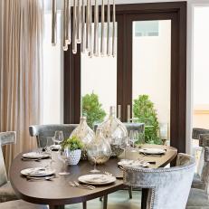 Contemporary Dining Room With Gray Chairs