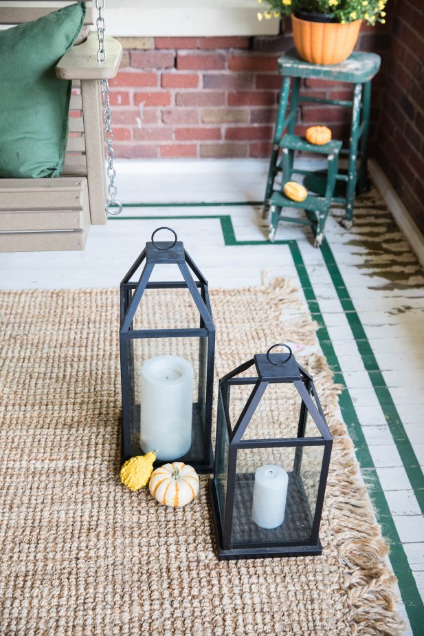 Two Lanterns Surrounded By Pumpkins For Fall