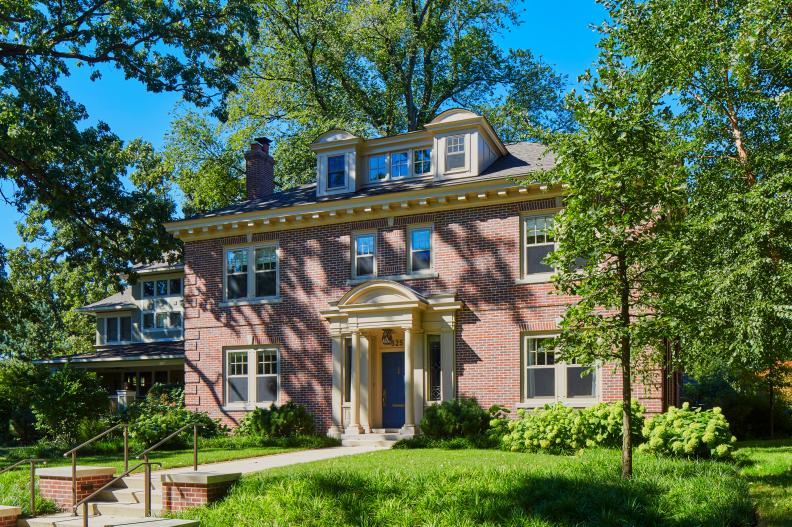 This historic Colonial Revival features a restored portico entry.