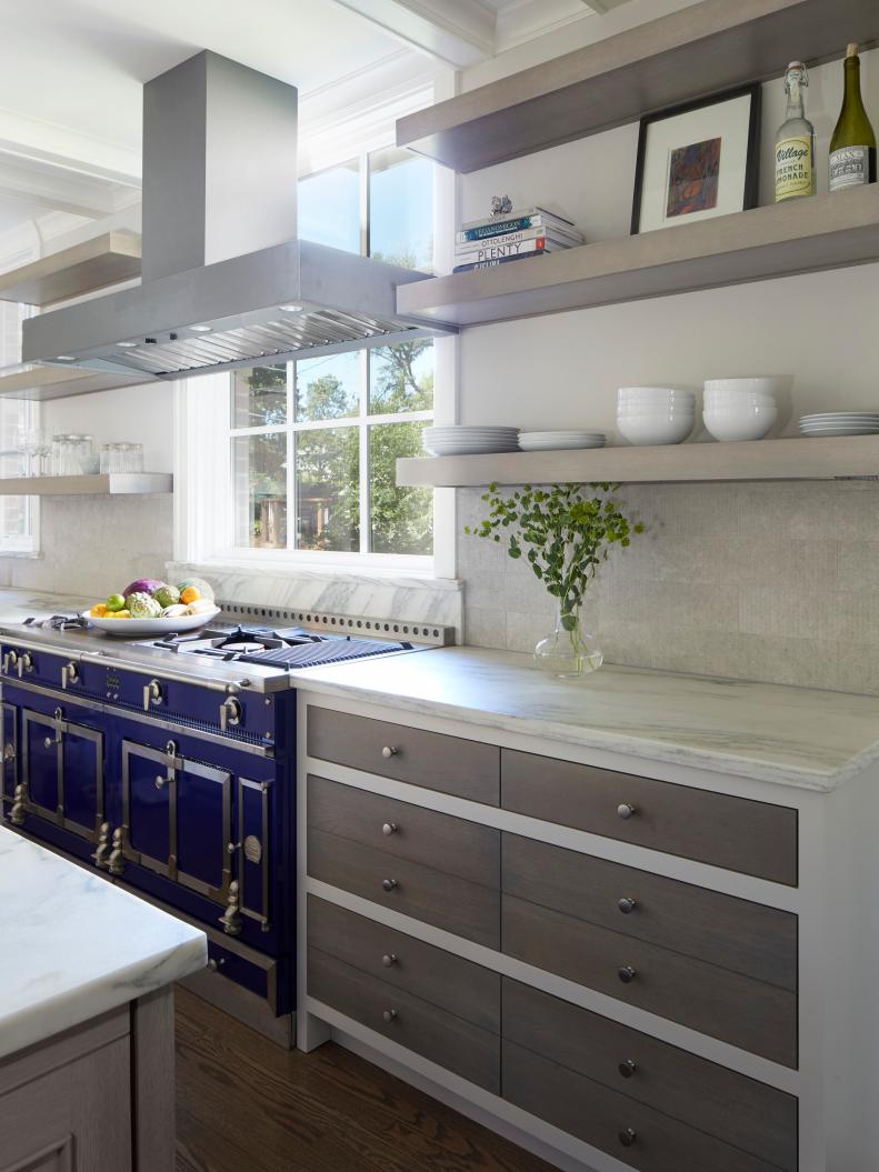 This renovated kitchen includes a blue La Cornue range.