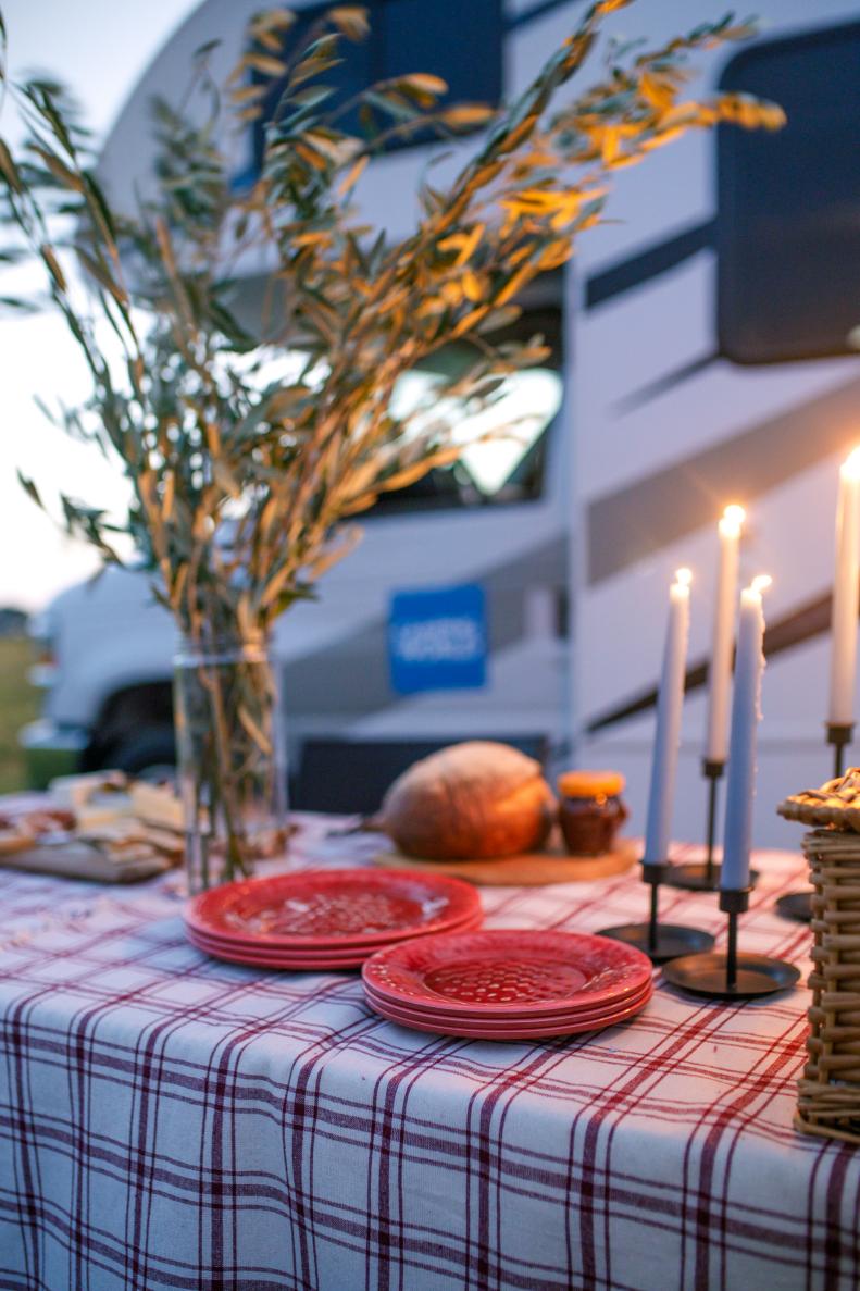 Dinner by candlelight can happen anywhere the road takes you with this spacious and functional RV. 