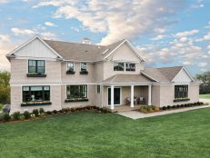 Classic cedar shake with white accents and black windows combine to create a neutral color palette that feels right at home in coastal New England.