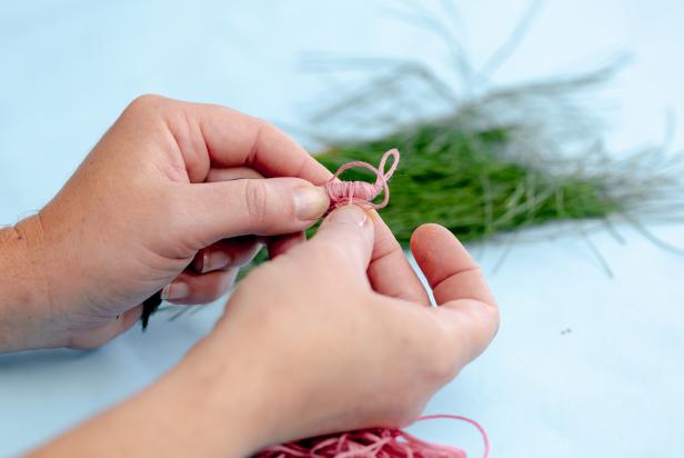 This colorful thread is used to bind pine needles together to create small tassels for Christmas presents.