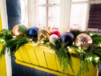 Christmas Decorations and Greenery Filling Window Box Planter