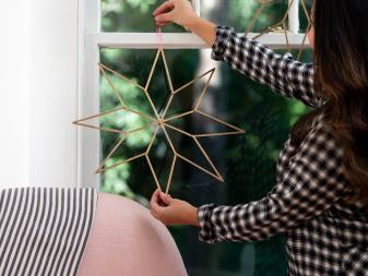 Hanging a DIY Christmas Star Decoration in a Window