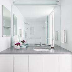 White Modern Bathroom With Gray Countertop