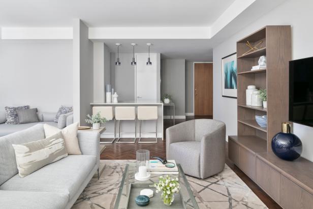 Gray Modern Living Room With White Flowers | HGTV