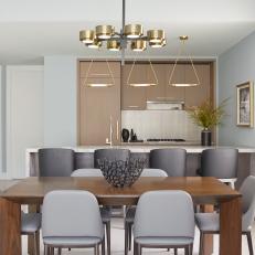 Gray Modern Dining Room With Leather Chairs