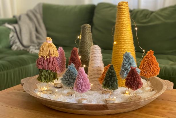 Display of Tassel and Wrapped Yarn Christmas Trees on Coffee Table