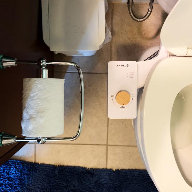 The TUSHY Classic bidet fits right onto your toilet seat and doesn't use electricity, instead connecting to your existing water supply with a flexible steel hose and adapter.
