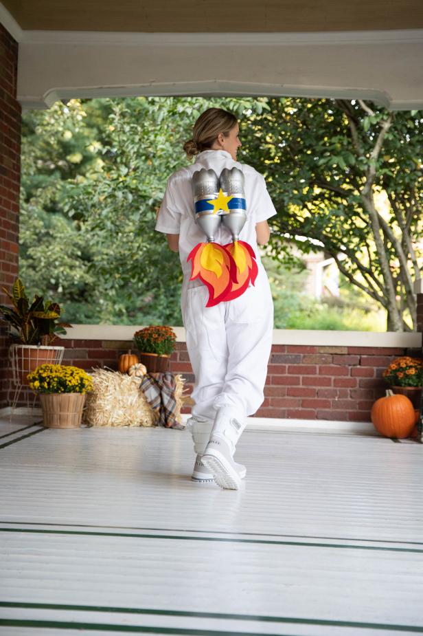 Woman in Astronaut Costume With DIY 2-Liter-Bottle Jetpack