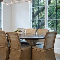 Neutral Transitional Dining Room With Wicker Chairs