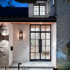 White Brick Exterior and Black Front Door