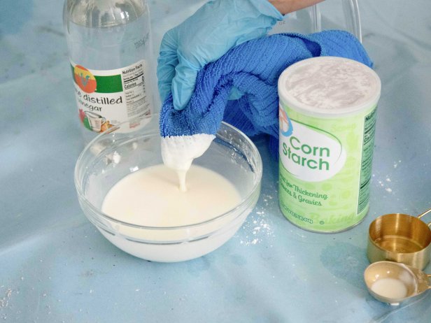 Mix 1/4 cup warm water, 1/4 cup white vinegar and 1/4 cup cornstarch in a bowl to make a paste.
