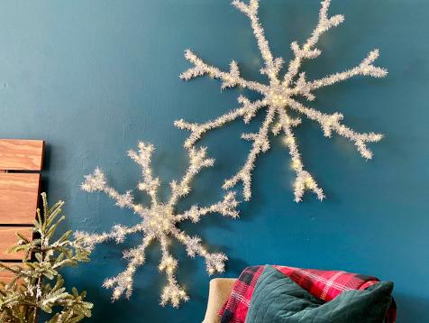 Turn Wire Hangers Into Oversized, Light-Up Snowflake Decorations