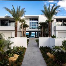 White Modern Oceanfront Mansion and Walkway