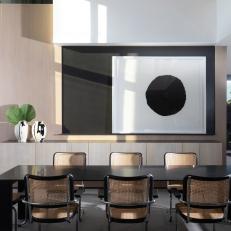 Modern Dining Room With Black Circle Art