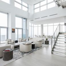 White Modern Living Room With Glass Stairs